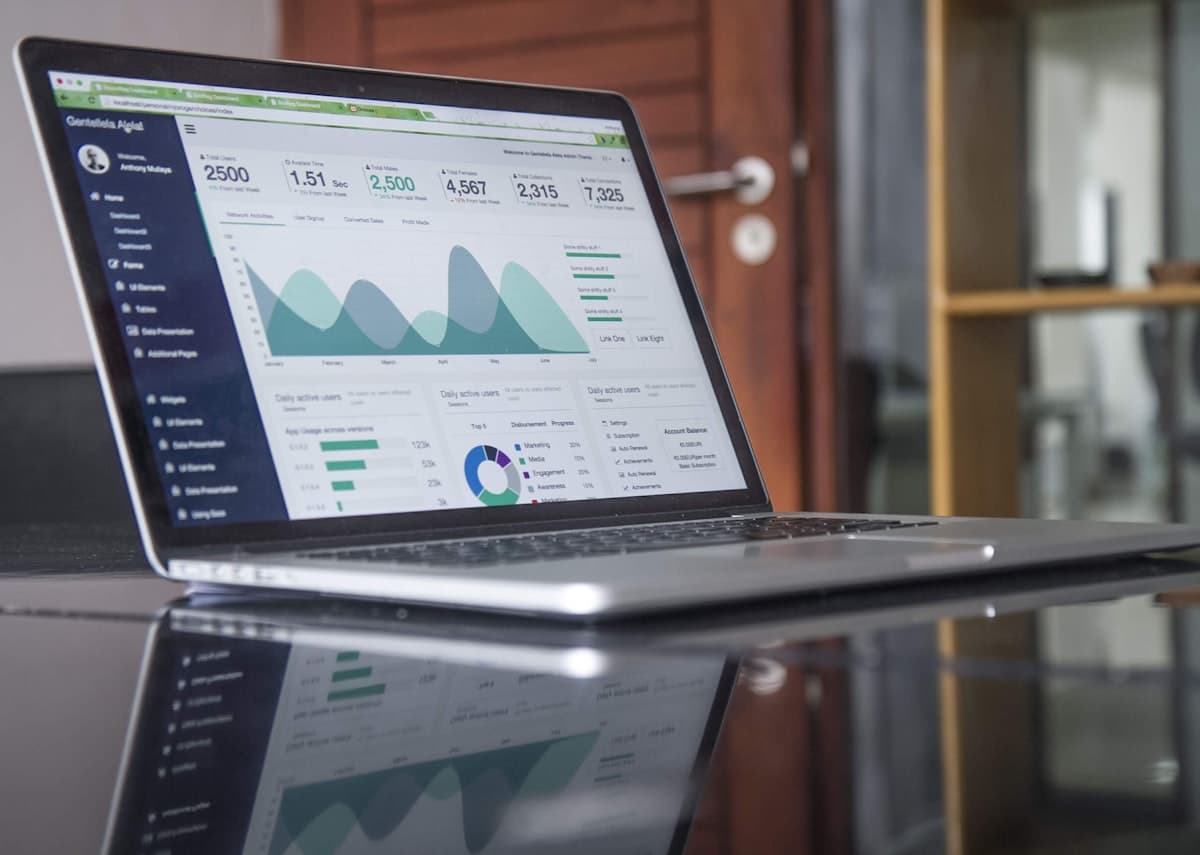Laptop screen showing a marketing analytics dashboard